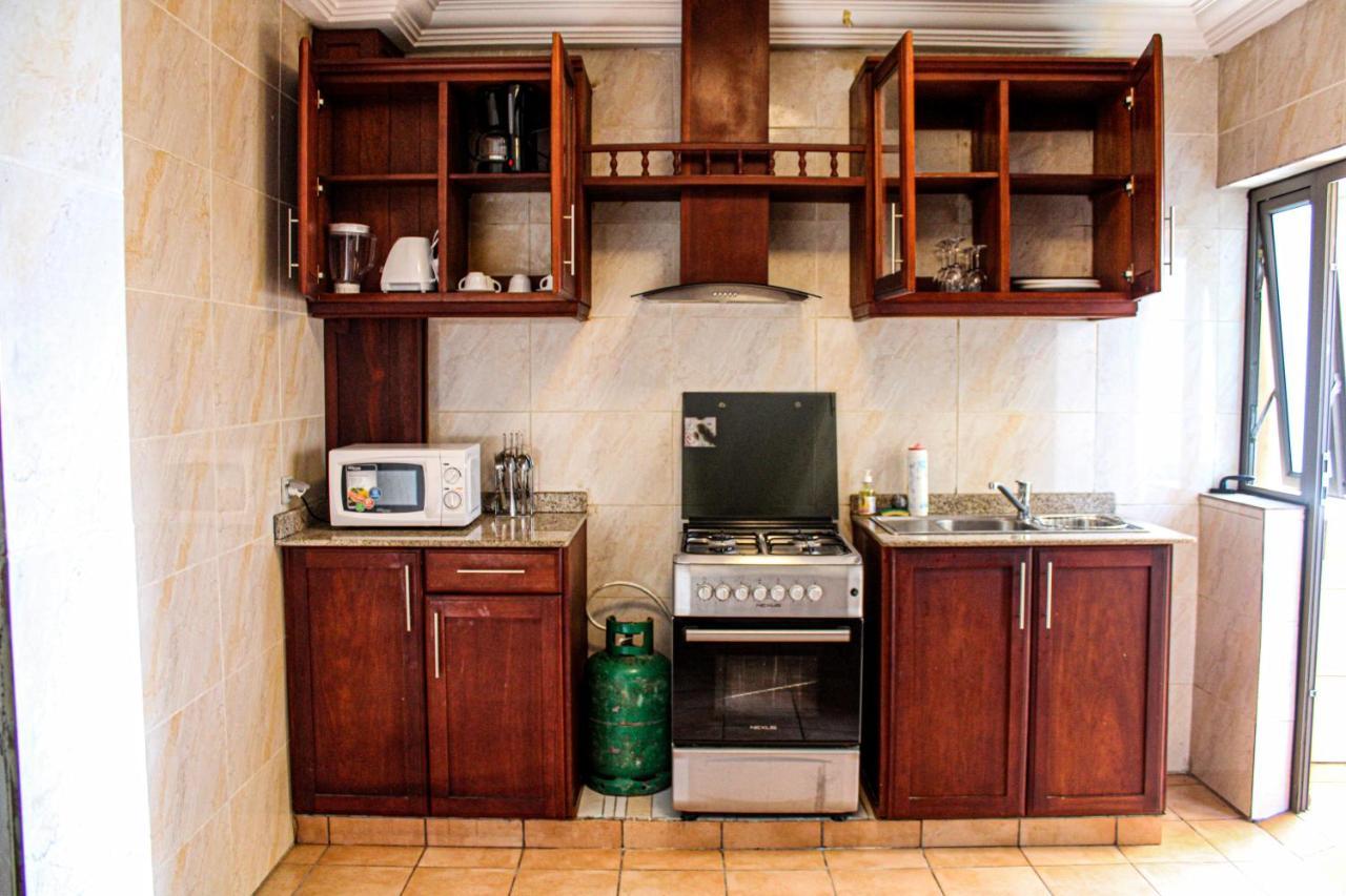 Residence Le Carat Bonapriso Дуала Экстерьер фото