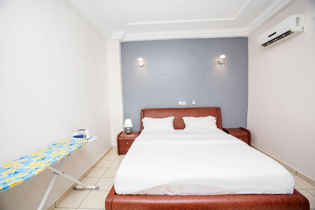 Residence Le Carat Bonapriso Дуала Экстерьер фото